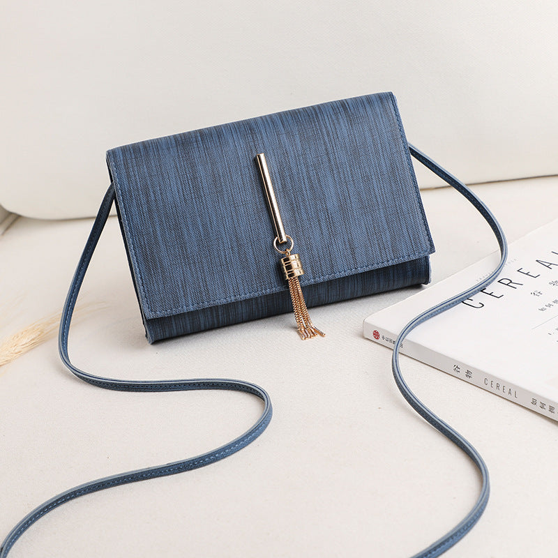 Women's bags 2020 summer new style Korean fashion messenger small bag tassel charm small square bag single shoulder handbag wholesale