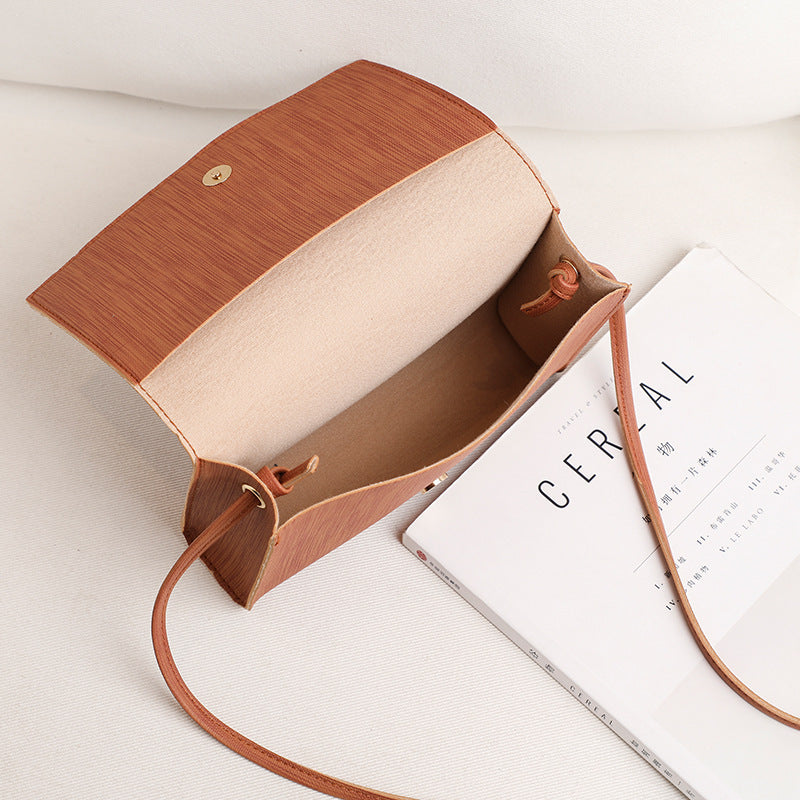 Women's bags 2020 summer new style Korean fashion messenger small bag tassel charm small square bag single shoulder handbag wholesale