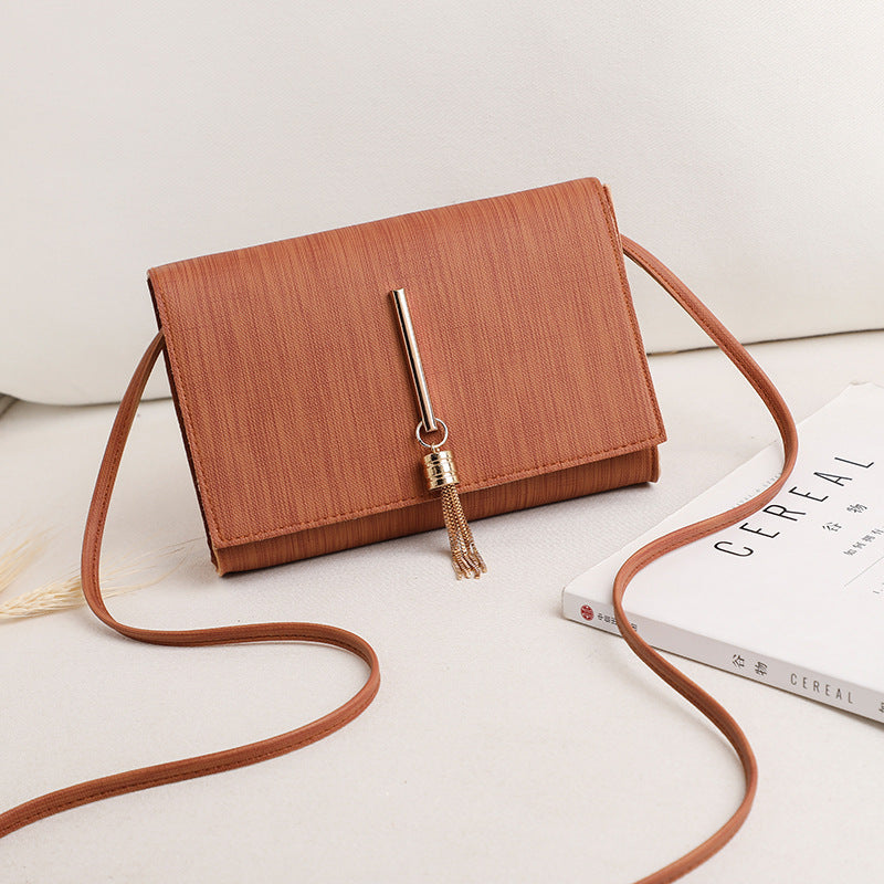 Women's bags 2020 summer new style Korean fashion messenger small bag tassel charm small square bag single shoulder handbag wholesale