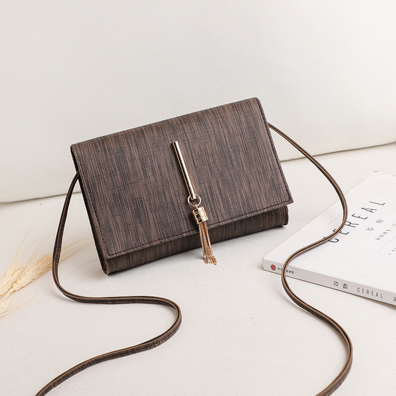 Women's bags 2020 summer new style Korean fashion messenger small bag tassel charm small square bag single shoulder handbag wholesale